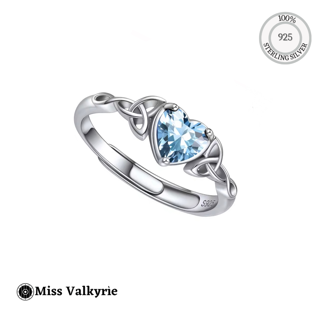 Miss Valkyrie sterling silver Celtic Birthstone ring with heart shaped blue gemstone and Celtic knot band