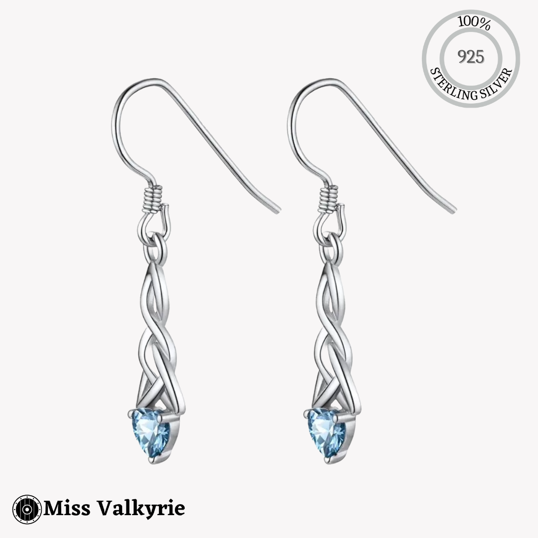 Sterling silver birthstone trinity knot dangling earrings with blue heart-shaped stones by Miss Valkyrie