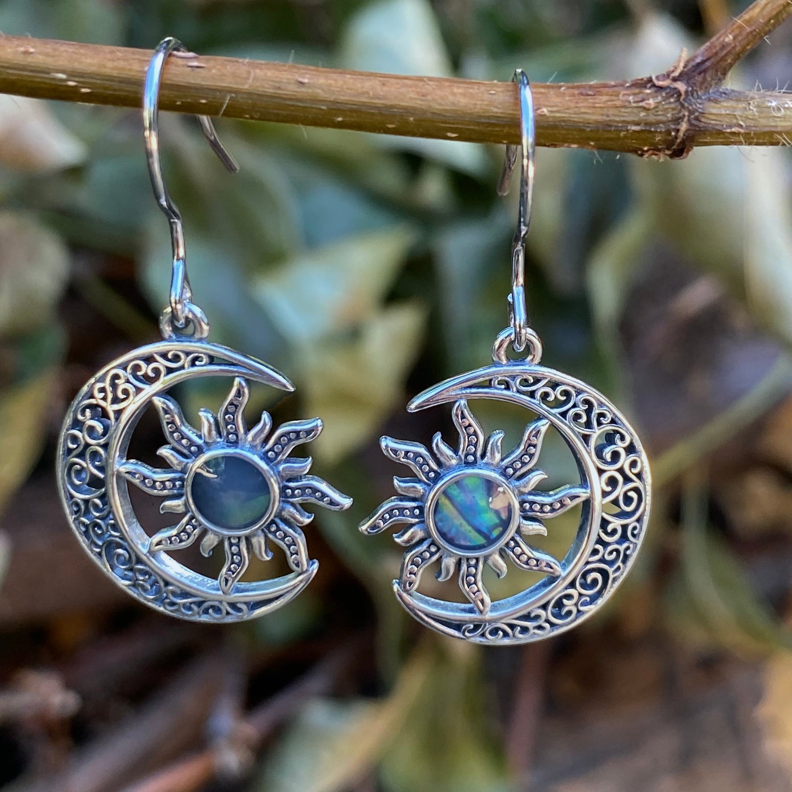 Sterling silver moon crescent sun earings with intricate design and colorful center stones by Miss Valkyrie