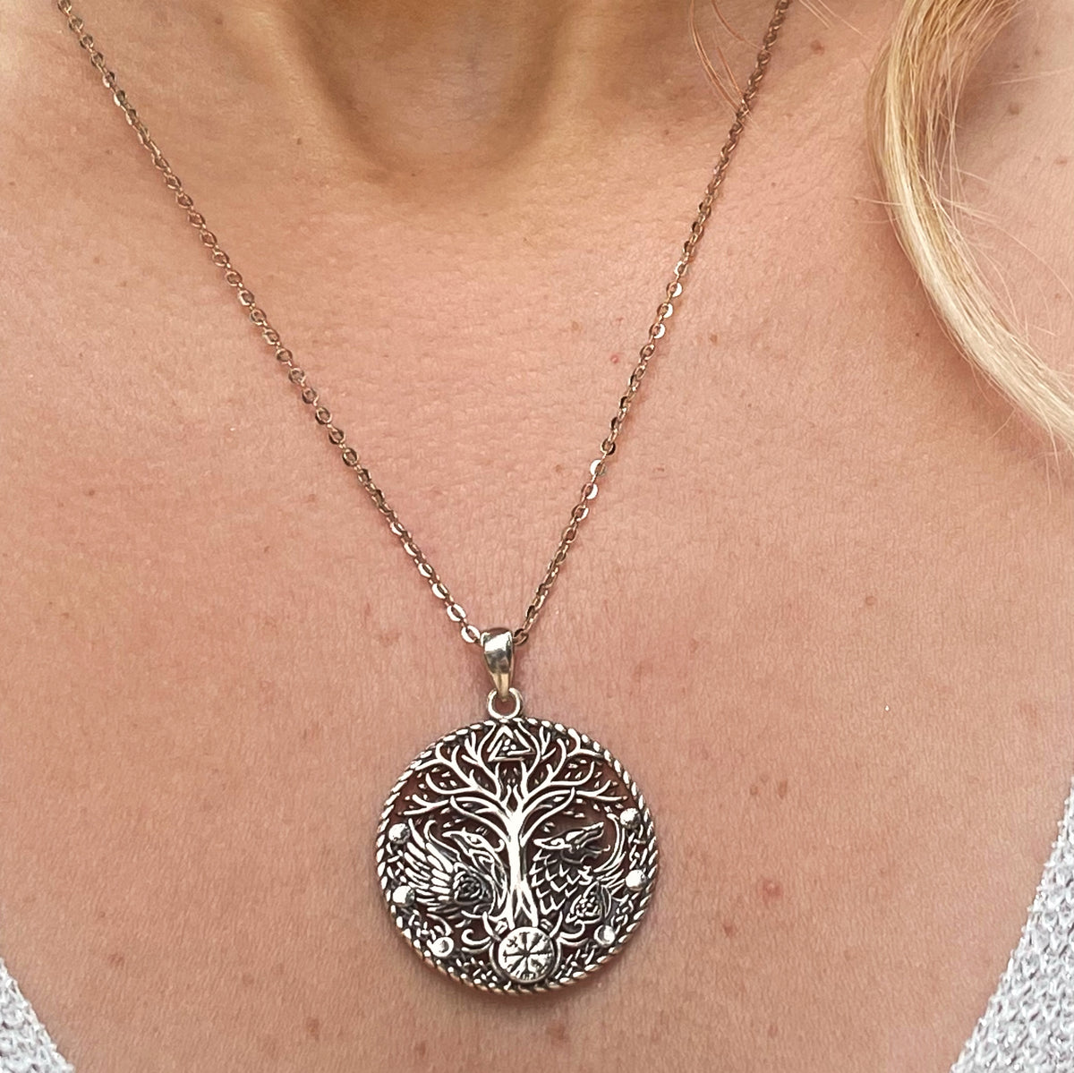 Sterling silver norse symbols necklace featuring an intricate tree of life pendant on a delicate chain