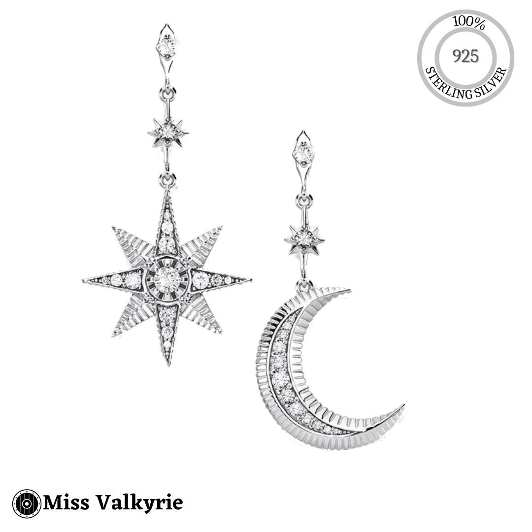 Sterling silver Star moon mismatched earrings featuring detailed star and crescent moon designs with sparkling accents