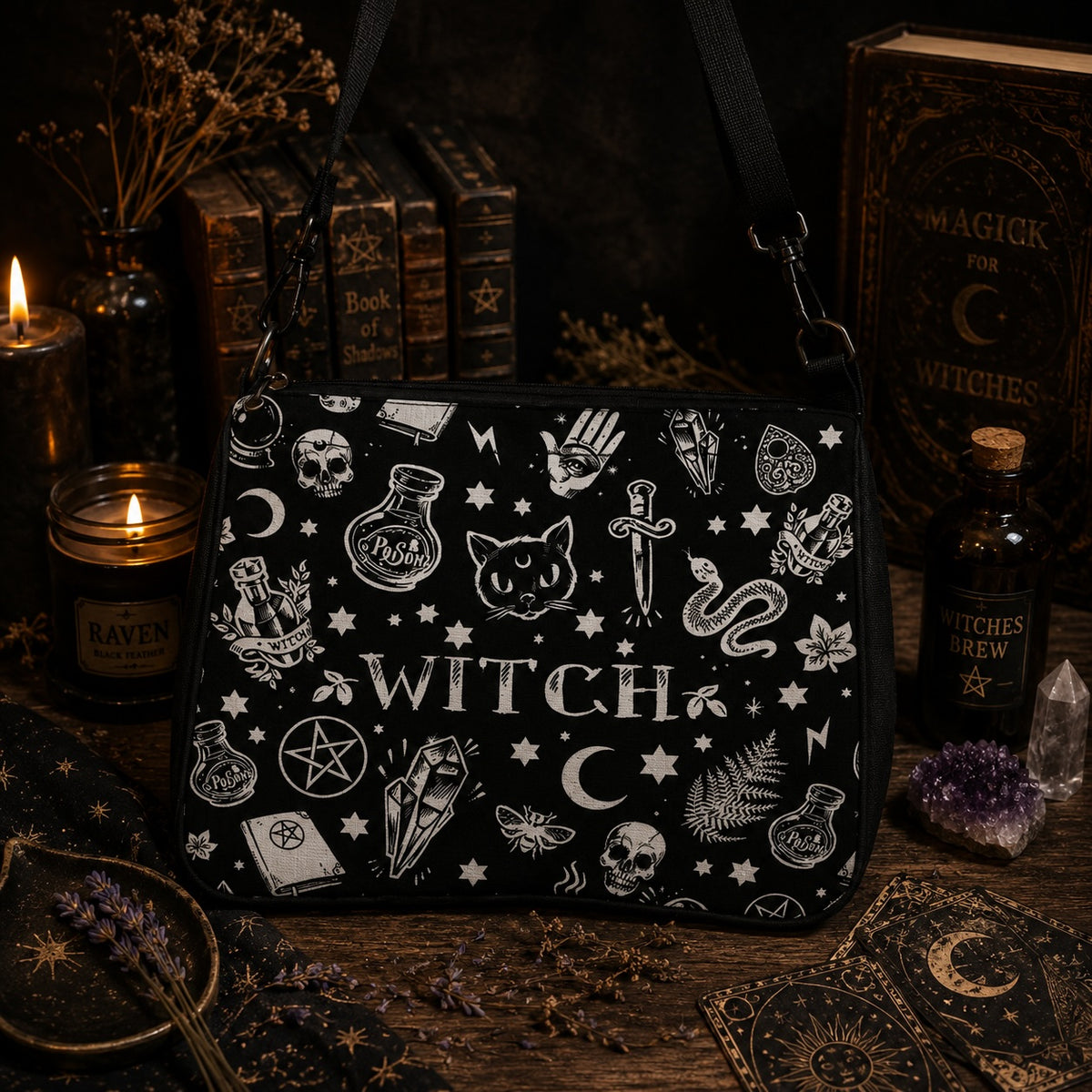 Witch's Grimoire Crossbody Bag featuring occult symbols and a stylish black design for witchy enthusiasts